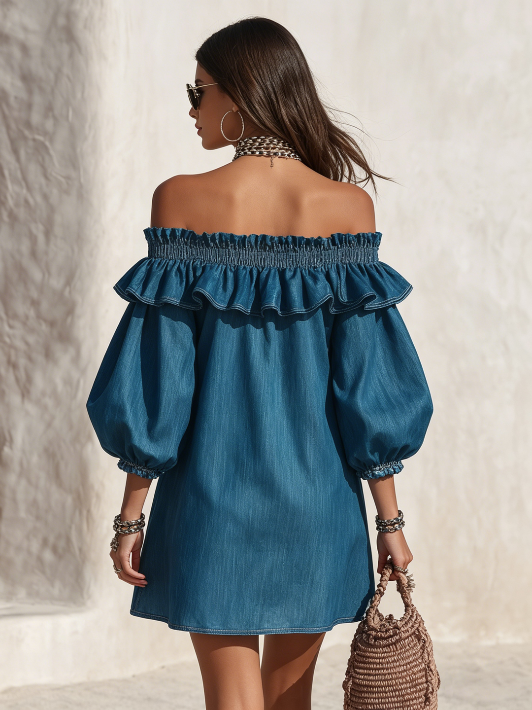 Resort style ruffled denim mini dress with off the shoulder and three-quarter sleeves