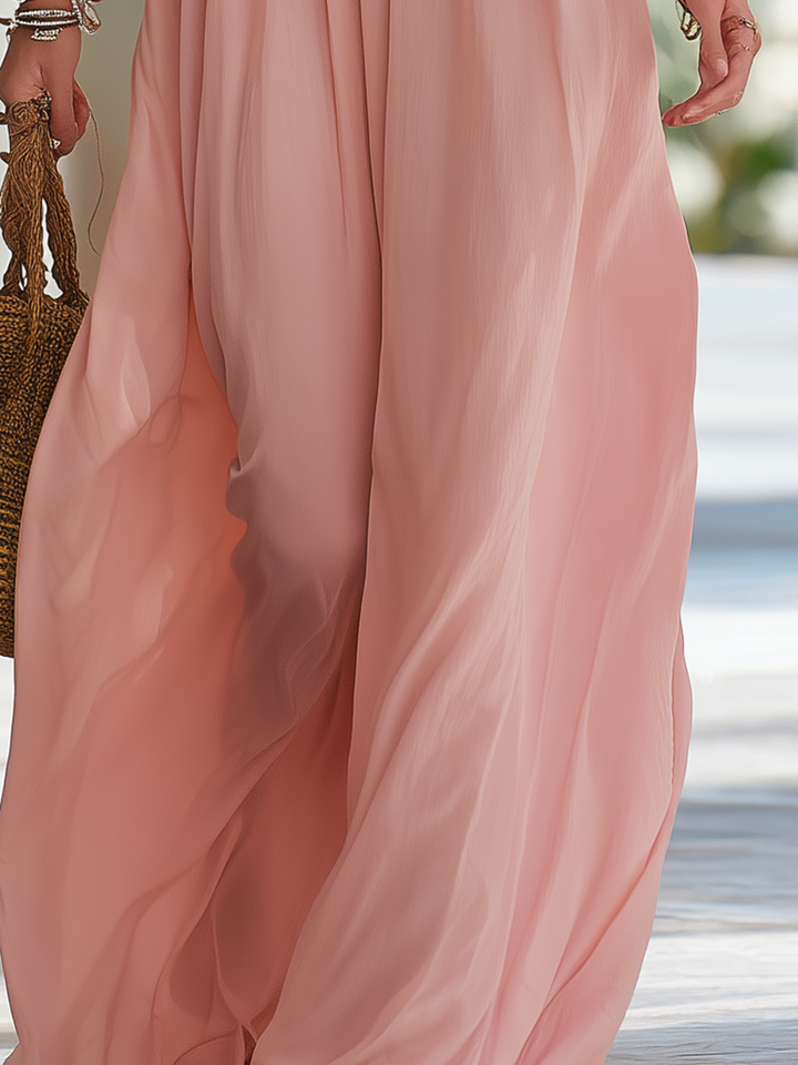 Chiffon maxi dress with vacation-style floral appliqués
