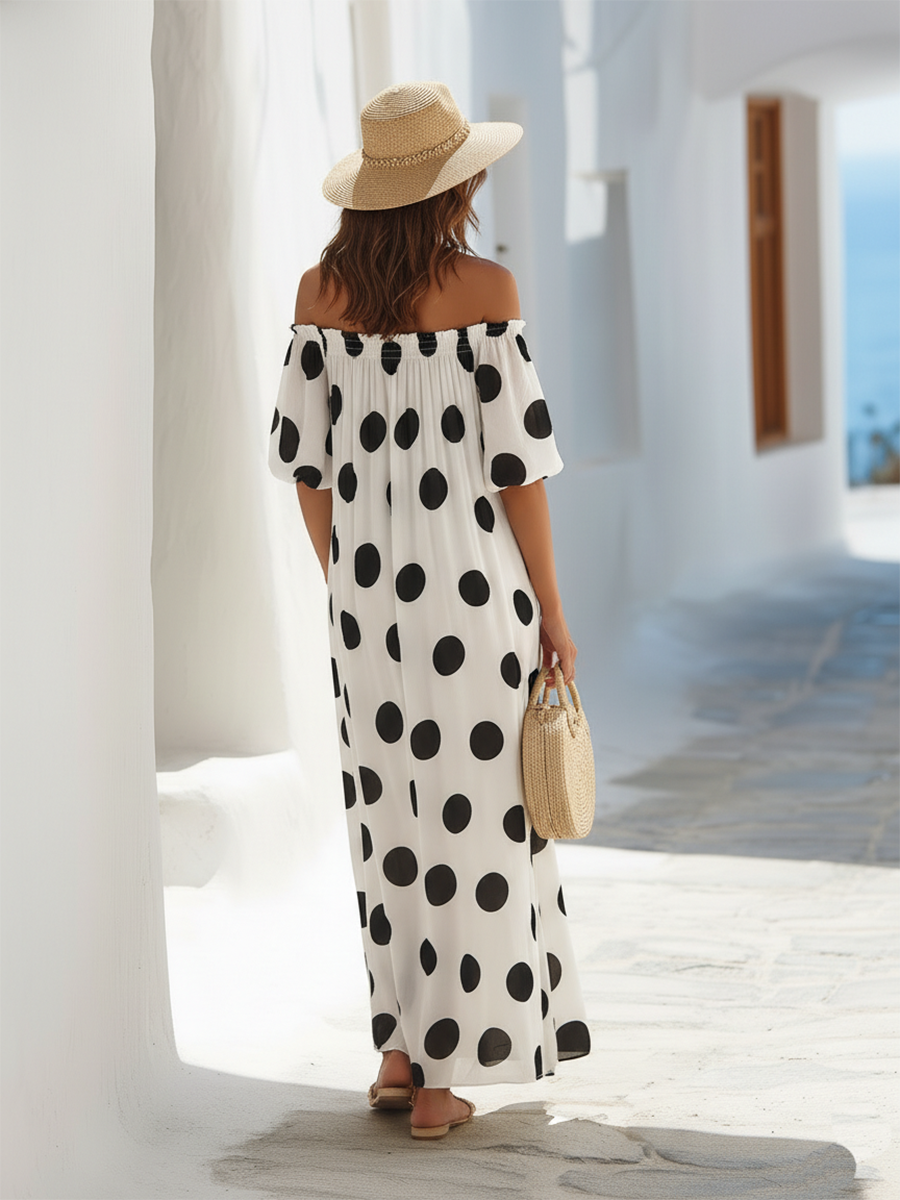 Maxi dress with black and white polka dots, seaside resort style, off-the-shoulder neckline