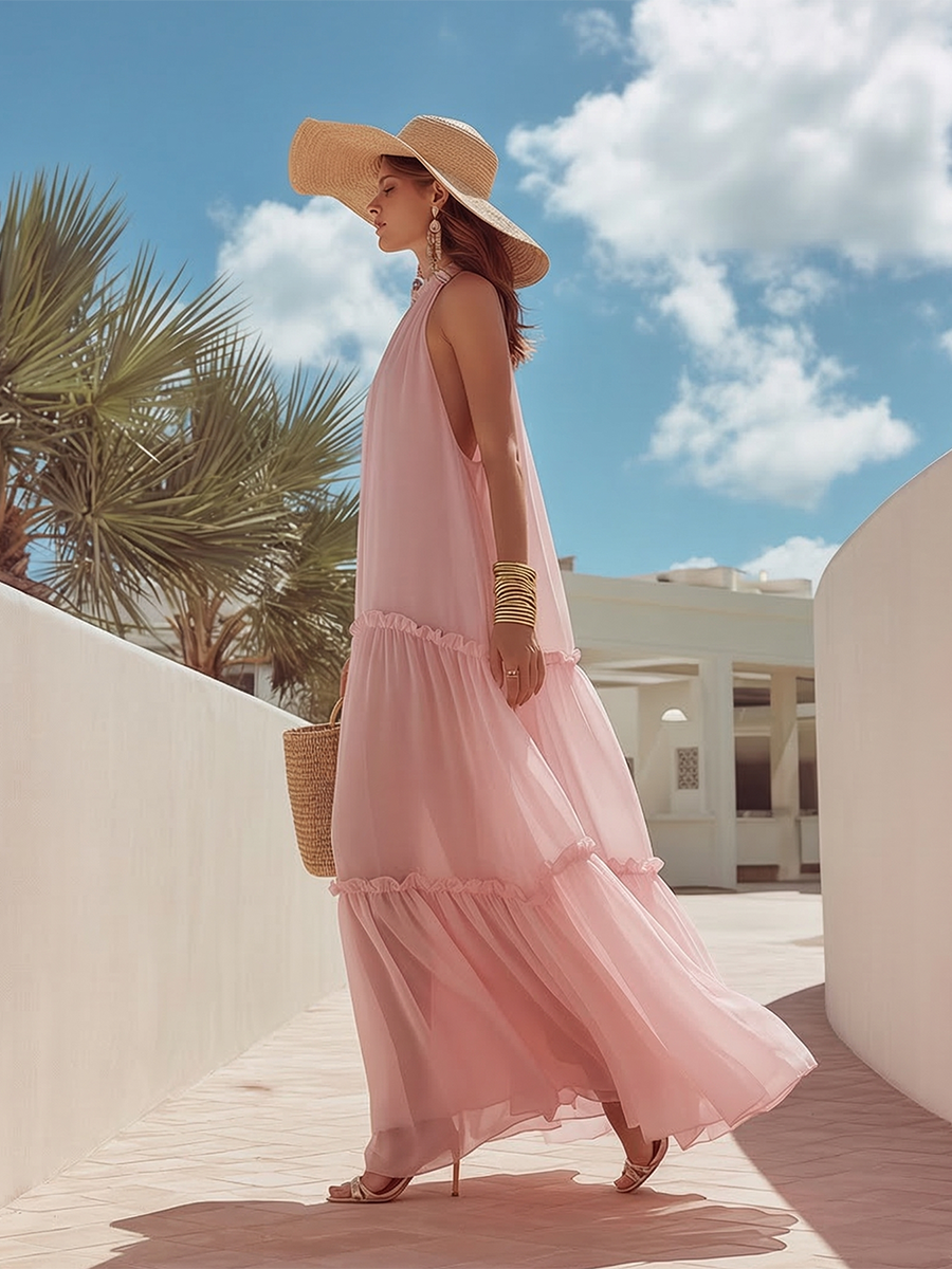 Sleeveless pink chiffon maxi dress with romantic ruffles